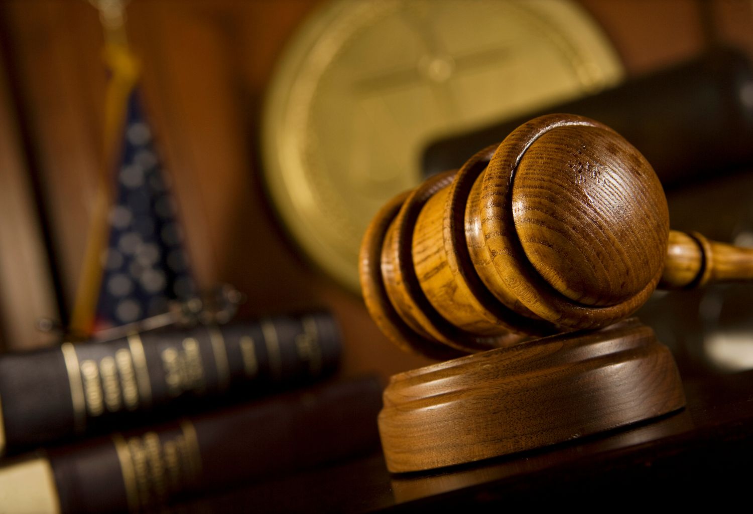 Gavel in court room: Collection Agencies vs. Small Claims Court Battles for Small Business